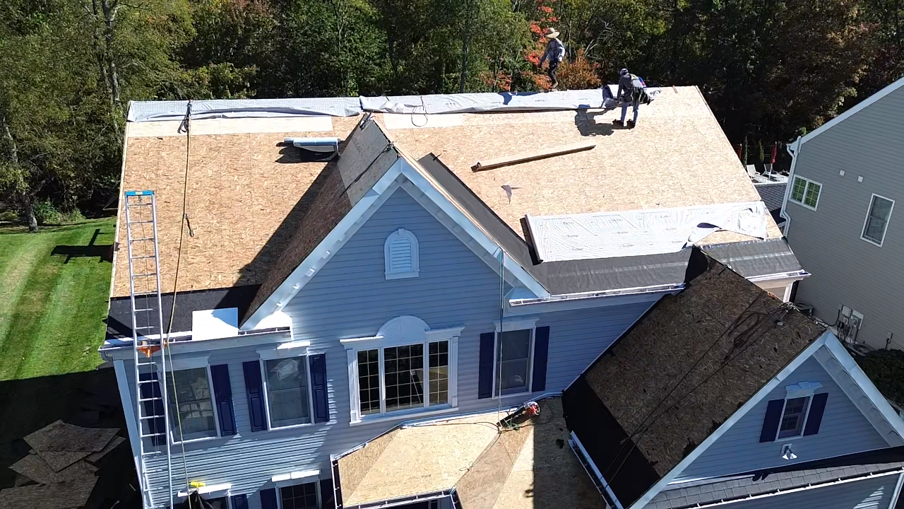 Roofing Contractors Beaver, PA 2 Roofing contractor working on a home in Beaver, PA